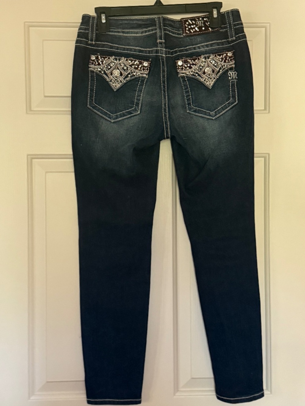 Like New Miss Me Hailey Ankle Dark Blue Jean. Size is 28 x 27.5